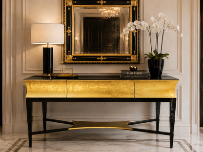 Credenza d'ingresso in foglia oro con top in pelle stampata effetto cocco