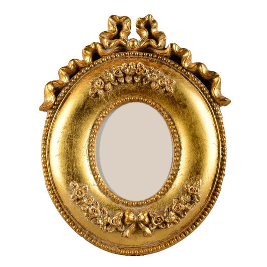 Portafoto ovale in foglia oro con fiocco e roselline